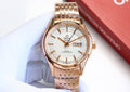 Reloj de pulsera OMEGA De Ville Hour Vision con esfera azul y calendario anual.