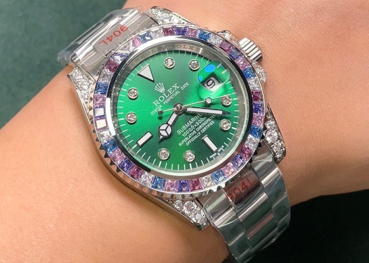 Rolex Yacht-Master
40 ref. 16622, brazalete Oyster, esfera brillante y bisel colorido.