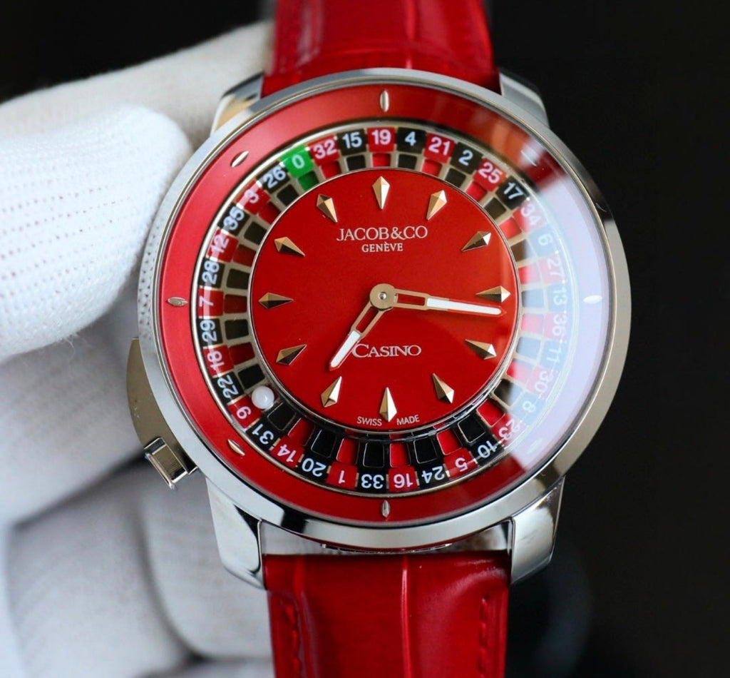 Lujoso reloj de pulsera inspirado en el modelo Casino de Jacob & Co., que destaca por su llamativa esfera roja con un diseño de ruleta funcional.