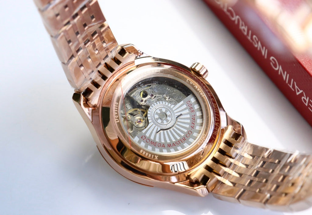 Reloj de pulsera OMEGA De Ville Hour Vision con esfera azul y calendario anual.